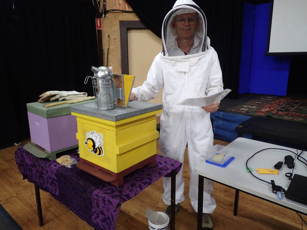 Wolf in his bee suit at the backyard beekeeping workshop